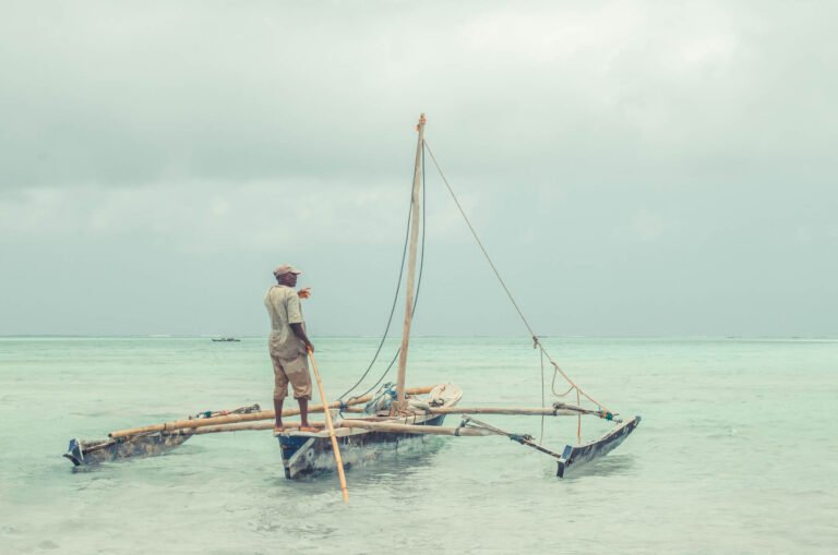 An outrigger canoe in the shallows at Makunduchi