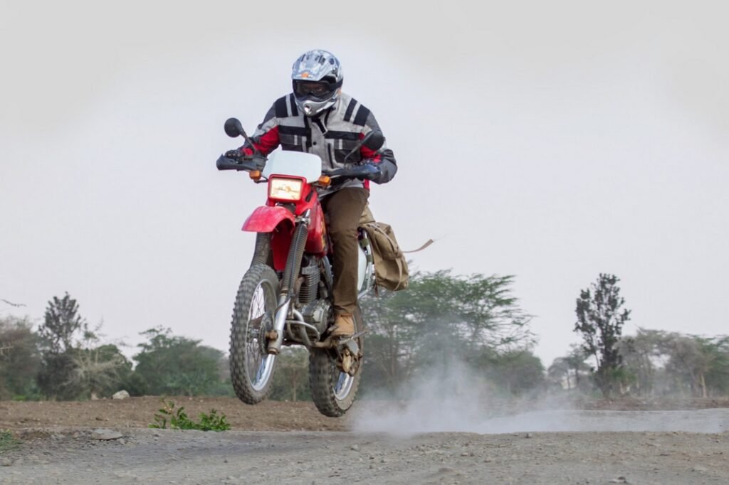 A motorbike on a winding forest road in the Usambara Mountains